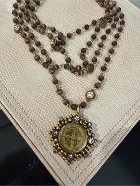 Virgins Saints & Angels Brown Beaded Necklace with Gold Medallion